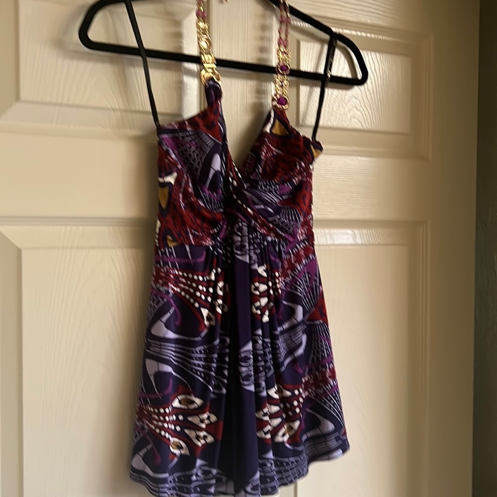 This Sky silk top is in perfect condition.